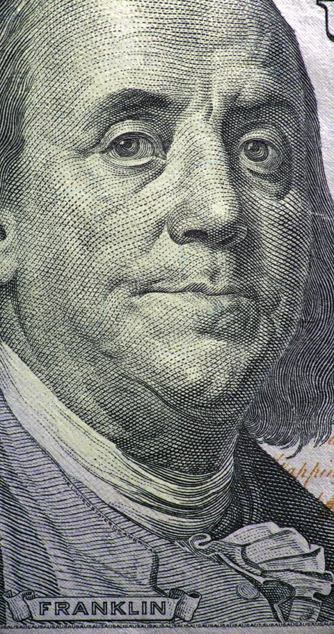 Changing 100 dollar bill with Franklin portrait stop motion. Stock Footage 345720965