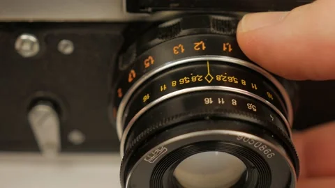 Changing The Aperture Dial Setting On A Photography Lens Stock Footage 153370043