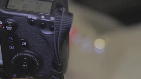 Changing aperture on DSLR camera press record Stock Footage 44456352