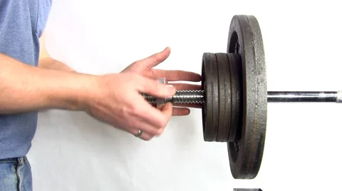 Changing barbell weights 7 Stock Footage 49591233