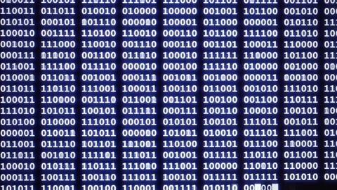 Changing binary code of computer program on display, programming, hacking, de Stock Footage 151294652