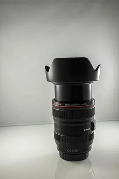 Changing the Canon system from EF to RF, selling old lens. Stock Photos