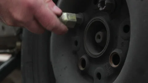 Changing a car tire _4 Stock Footage 32864733