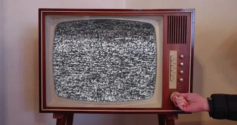 Changing channels using the switch on an old TV Stock Footage 171136242