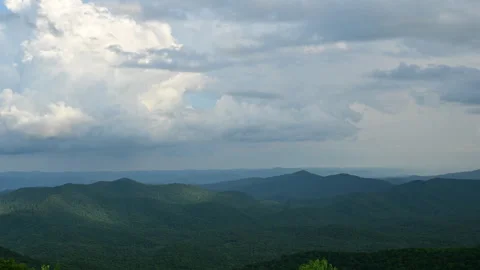 Changing cloud formations over the mountains, time lapse Stock Footage 314127642
