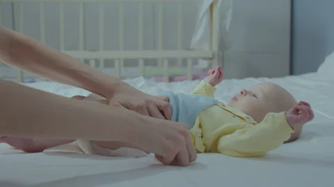 Changing Diaper on baby 4 normal speed Stock Footage 264640795