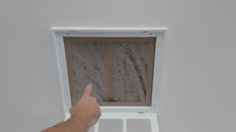 Changing Dirty Air Conditioner Ceiling Filter – Home Maintenance Stock Footage 317587168