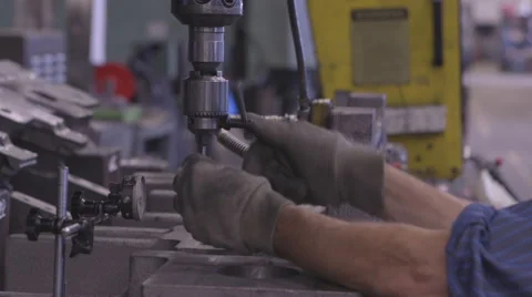 Changing drill bit in tool and die shop Stock Footage 62896311