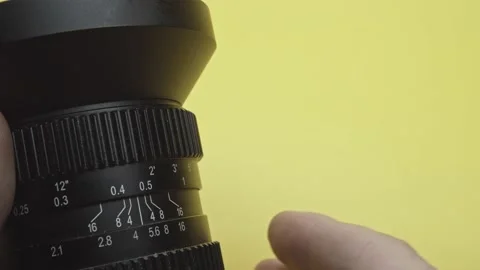 Changing focus on the lens Stock Footage 130586019