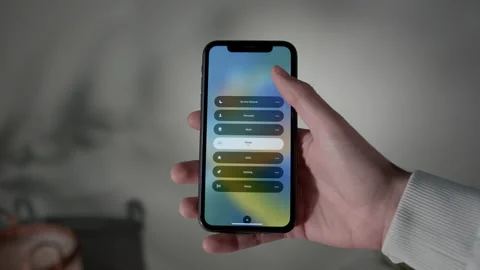 Changing focus mode on iPhone with IOS 16, POV Stock Footage 217764056