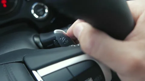 Changing Gears Using Paddle Shifters of a Car While Driving Stock Footage 132597846