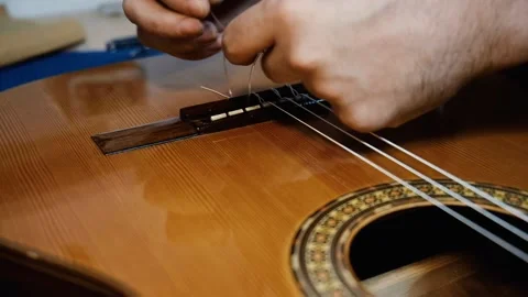 Changing guitar strings Stock Footage 160969067