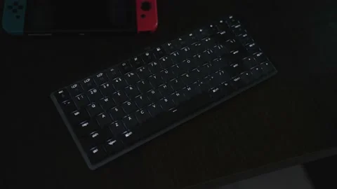 Changing the LED style of wireless mechanical keyboard Stock Footage 203961420