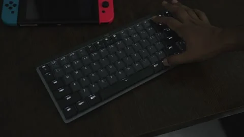 Changing the LED style of wireless mechanical keyboard Stock Footage 203961478