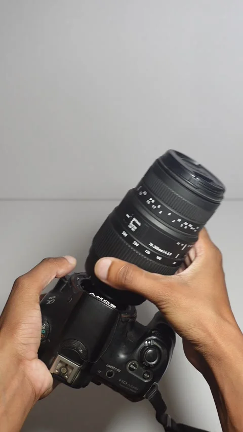 Changing The Lens On A Sony Camera, First Person POV: Sibi, Pakistan 8 Sep 2026 Stock Footage 346412815