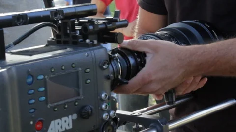 Changing the lens on a video camera Stock Footage 91751598