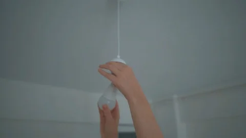 Changing light bulb, lamb concept. Person is holding, Stock-Footage 112274131