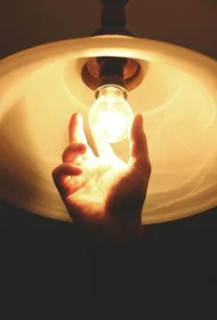 Changing light bulb Foto stock