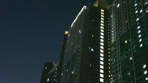 The changing lighting conditions of condominium residential buildings , tim.. Stock Footage 227234685