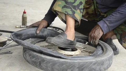 Changing motorcycle tire. Stock Footage 77749106