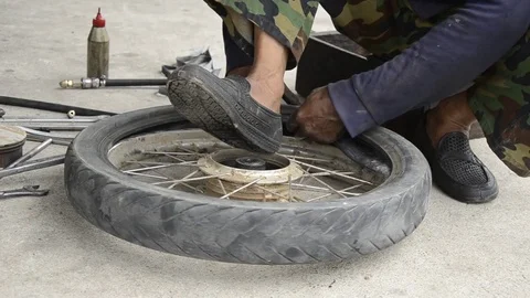 Changing Motorcycle tire. Stock Footage 77749254