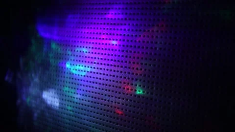 Changing multicolored glow on a dark blue background to a black dot Stock Footage 143848091