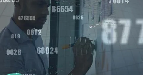 Changing numbers and financial data processing against man writing on memo notes Stock Photos