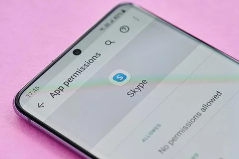 Changing permissions setting of skype app Stock Photos