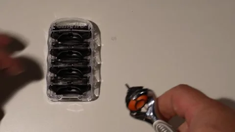 Changing rasor blade C0030 Stock Footage 254907336