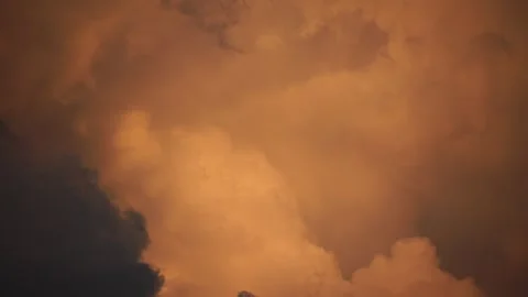 Changing Sky: Close-Up Time-Lapse of Dramatic Clouds at Sunset Stock Footage 317672873