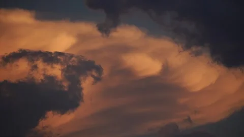 Changing Sky: Close-Up Time-Lapse of Dramatic Clouds at Sunset Stock Footage 317672877