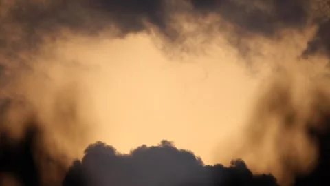 Changing Sky: Close-Up Time-Lapse of Dramatic Clouds at Sunset Stock Footage 317672899