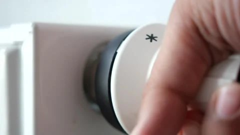 Changing temperature on heating radiator Video stock 240894122