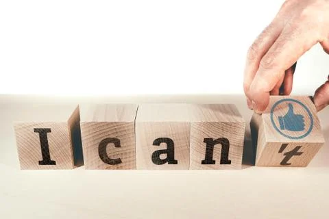 Changing text I can not to I can on wooden blocks Stock Photos