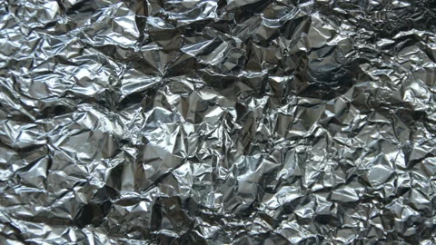 Changing the texture of crumpled aluminum foil Stock Footage 101975950
