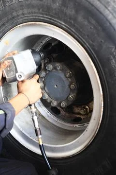 Changing Tire with Impactor Stock Photos