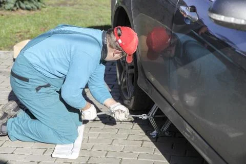 Changing tires Stock Photos