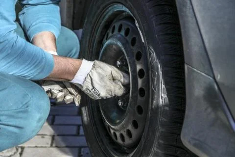 Changing tires Stock Photos