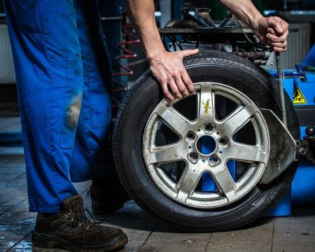 Changing tires Stock Photos