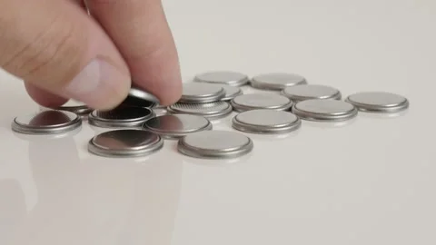 Changing watch button battery close-up 4K footage Stock Footage 98983953