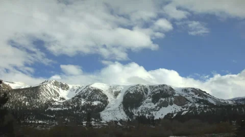 CHANGING WEATHER OVER THE MOUNTAINS Stock-Footage 5701150