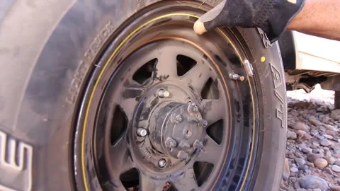 Changing Wheel Stock Footage 246089629