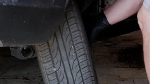 Changing wheels in a car service. Rubber replacement, anti-corrosion treatment 動画素材 248166575
