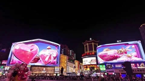 CHANGSHA, CHINA - 2026 May, 24: Crowds of people gathering at Wuyi Square Stock Footage 340613397