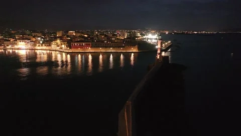 Chania town by night, Lighthouse, Drone shot, Crete, Greece, Aerial view of Chan Stock Footage 290006411
