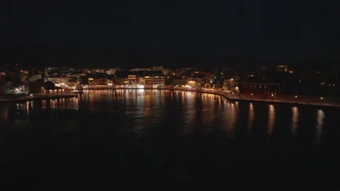 Chania town by night, Lighthouse, Drone shot, Crete, Greece, Stock Footage 296604493
