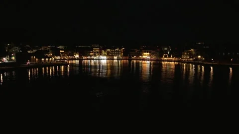 Chania town by night, Lighthouse, Drone shot, Crete, Greece, Aerial view of Chan Stock Footage 297224251
