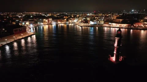 Chania town by night, Lighthouse, Drone shot, Crete, Greece, Aerial view of Chan Stock Footage 300609423