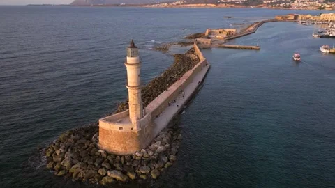Chania town by night, Lighthouse, Drone shot, Crete, Greece, Aerial view of Chan Stock Footage 303589396
