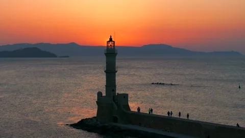 Chania town by night, Lighthouse, Drone shot, Crete, Greece, Aerial view of Chan Stock Footage 303997099
